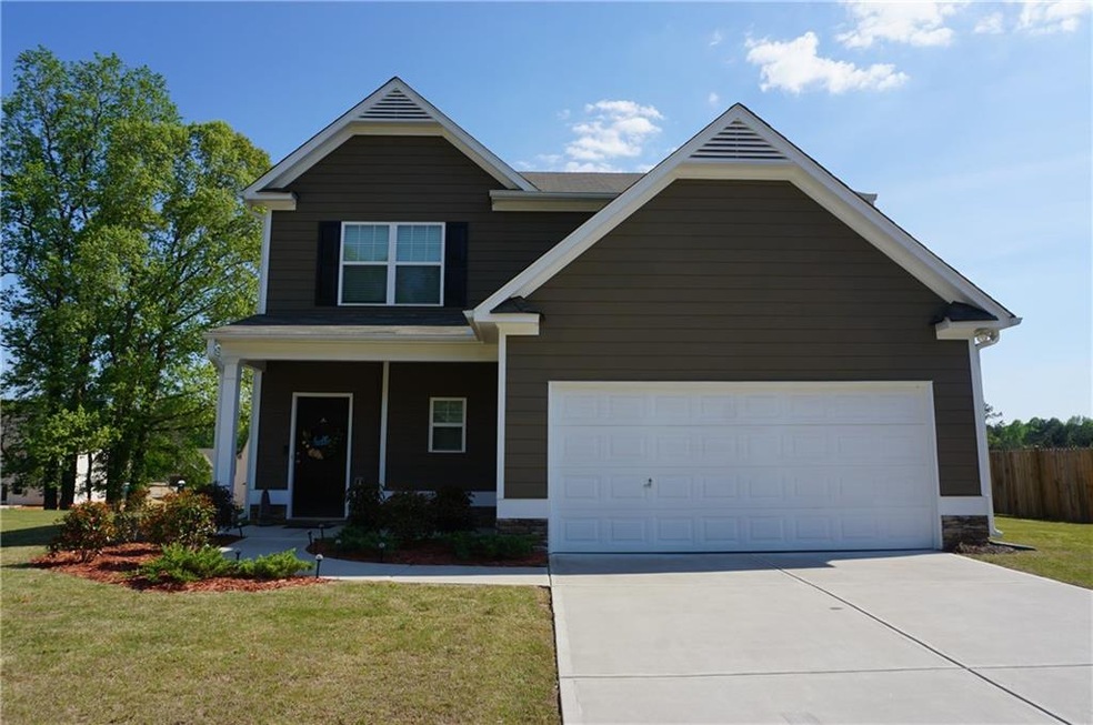 Great curb appeal and a level front and back yard!