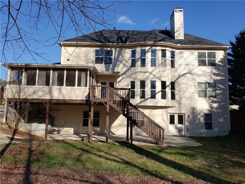 Daylight basement, screened porch, privacy fence around large back yard