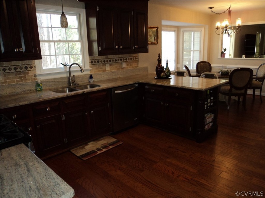 Refinished cabinets, Granite countertops, tile bac