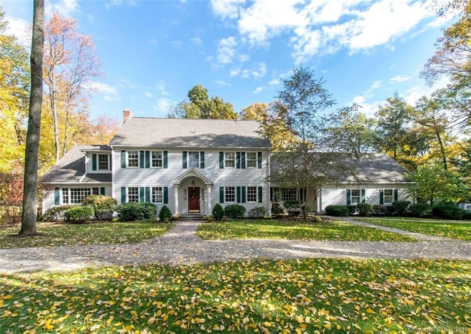 Expansive Colonial set on cul-de- sac has been imp