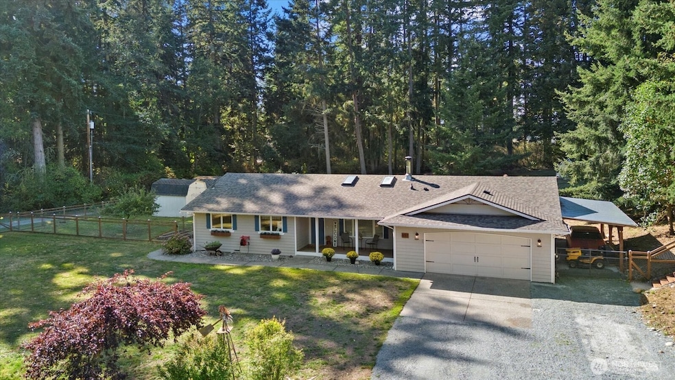 Camano Island Rambler on over an acre on a private corner lot.