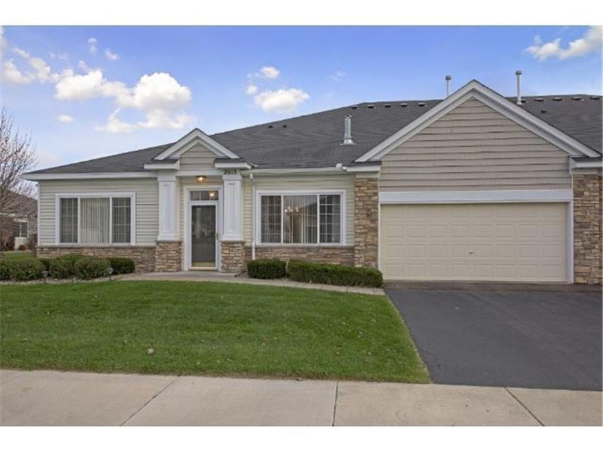 Prime end unit townhome with a beautiful yard.  It