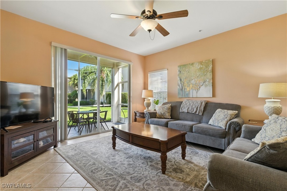 1415 Sweetwater Cove unit 104, Naples, FL 34110 - photo 1