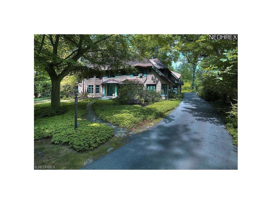 The impressive and well-maintained home is set bac