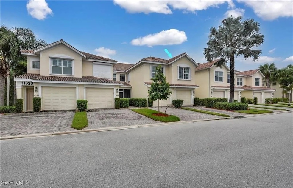 View of front of property with an attached garage,