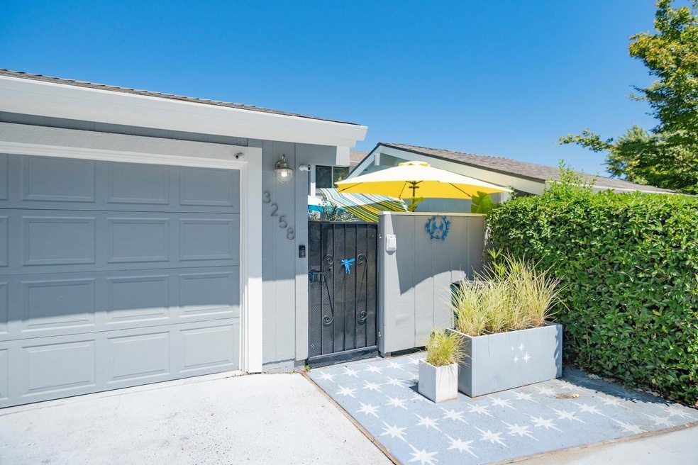 Be amazed as you walk through this gate to see this beautiful townhome.