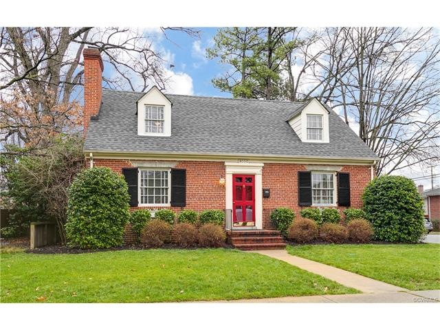 Classic brick Cape with dimensional shingle roof