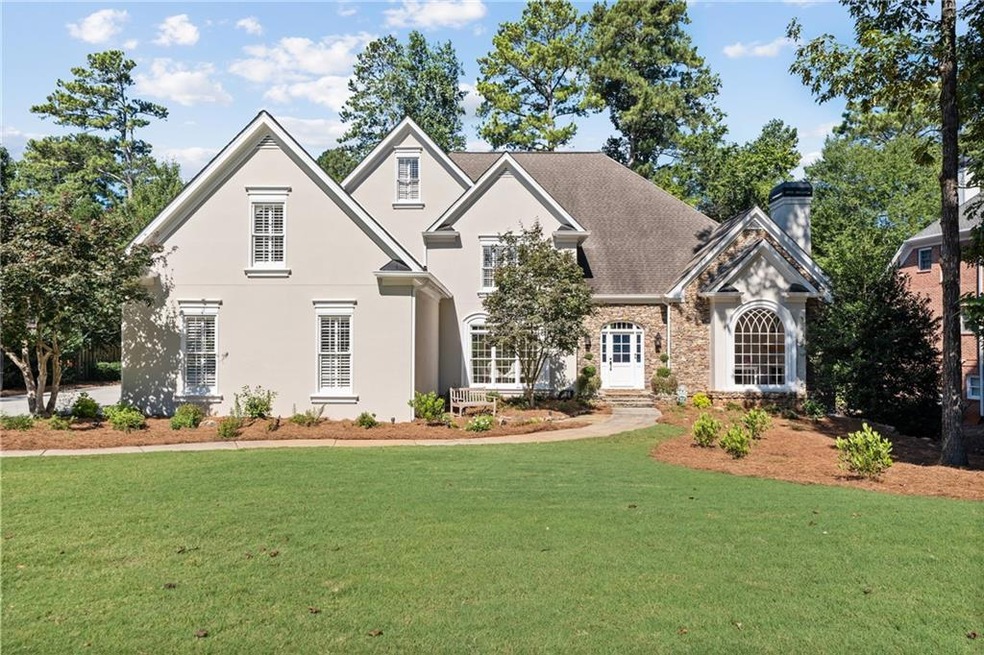 Hard coat stucco with stone