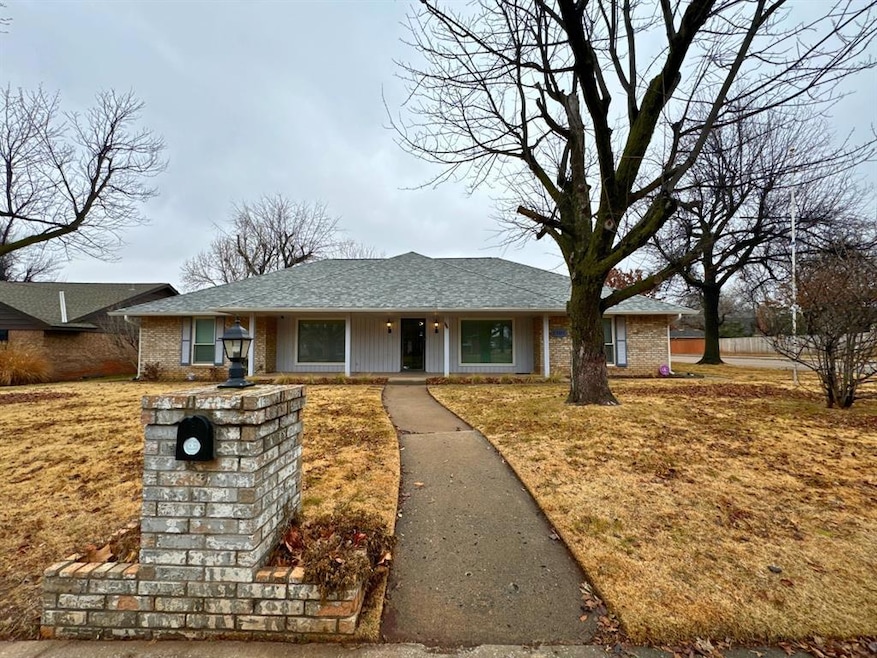 Ranch-style house with a front yard