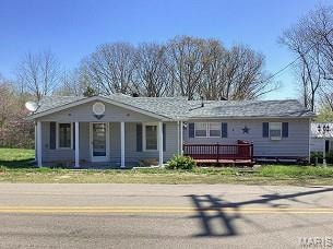 View of front of property featuring a porch