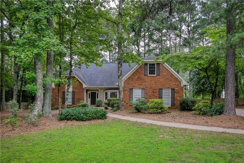 Wonderful 3 sides brick home in a S/T community in
