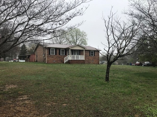 Charming full brick on a great lot! features 3 bedrooms 2 full baths open floor plan hardwoods, neutral coloring & so much more