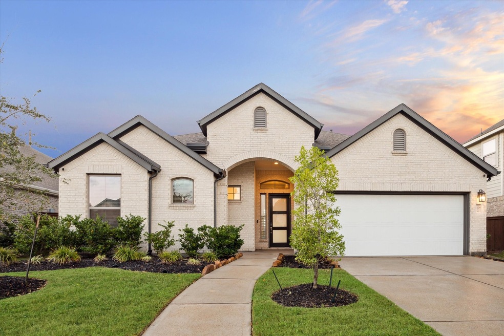 This is a modern single-story home with a full bri