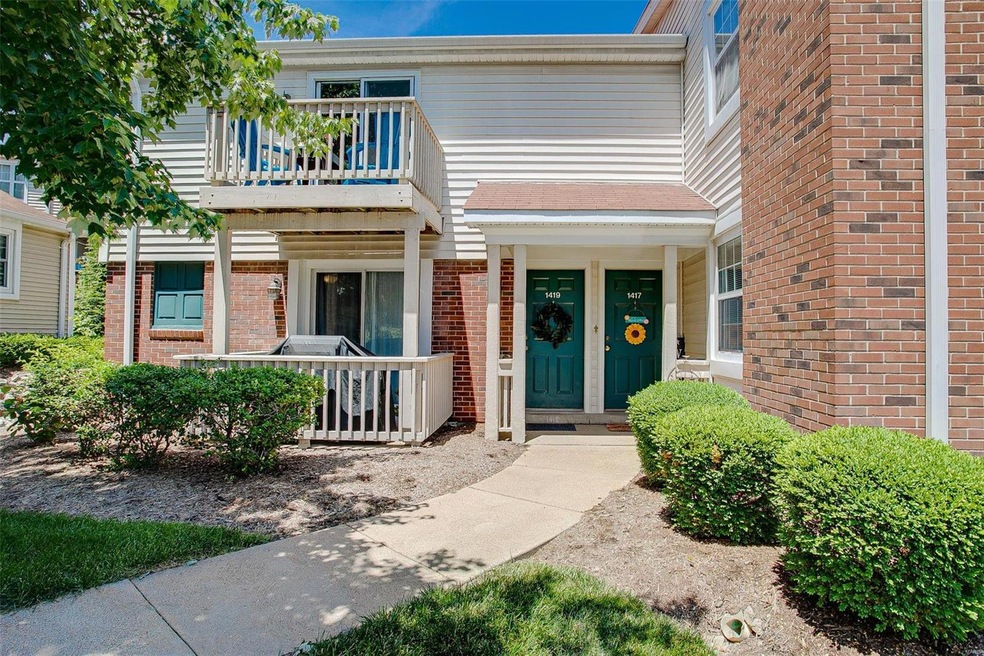 Front door on the right side.  Leads to 2nd floor 