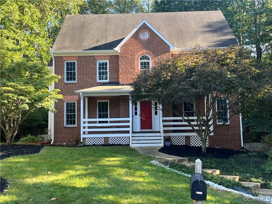 View of front of house featuring a porch and a fro