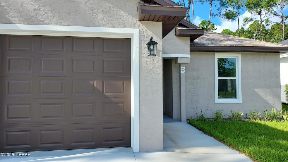 44 Regency Dr unit B, Palm Coast, FL 32164 - photo 1