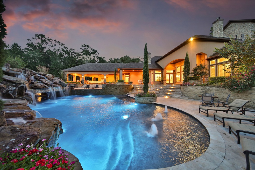 Magazine quality elements overtake the view-filled outdoor resort setting.  Enjoying the sparkling pool is made easy with many choices of luxurious seating areas.