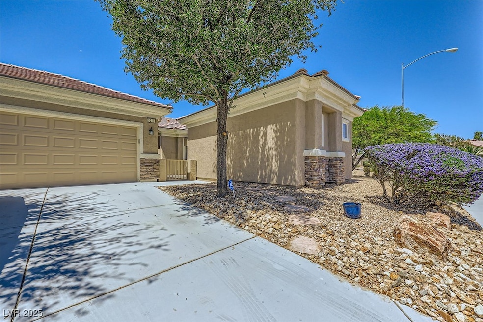 View of front of property featuring stucco siding,