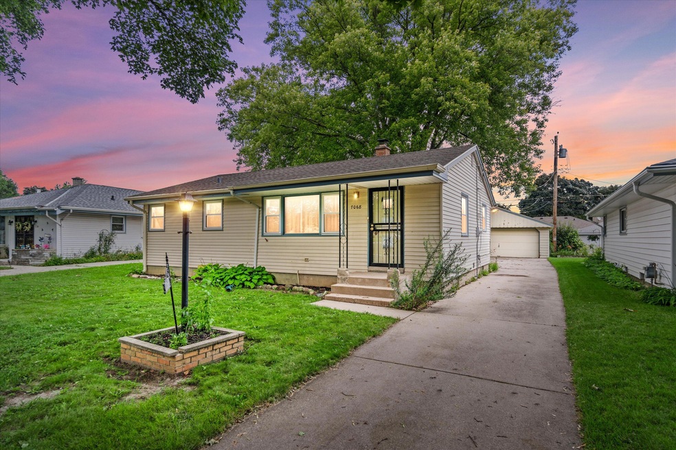 7068 N 38th Ct, Milwaukee, WI 53209 - photo 1