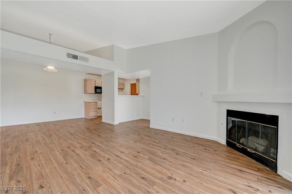 Unfurnished living room with light wood-type floor