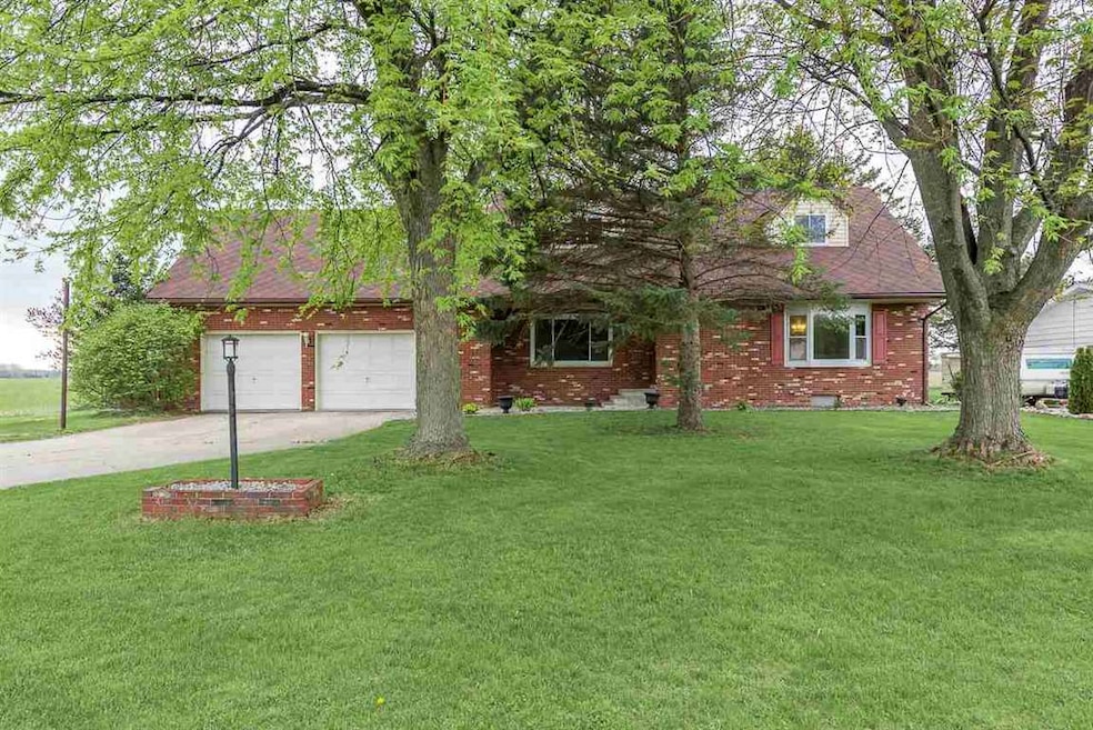 NEW COUNTRY LIVING! Located in the country while minutes from the city, this 4 bedroom, 2 bathroom home is move-in ready and loaded with features that today's buyer is looking for. New carpet, light fixtures, paint, and recently updated kitchen!