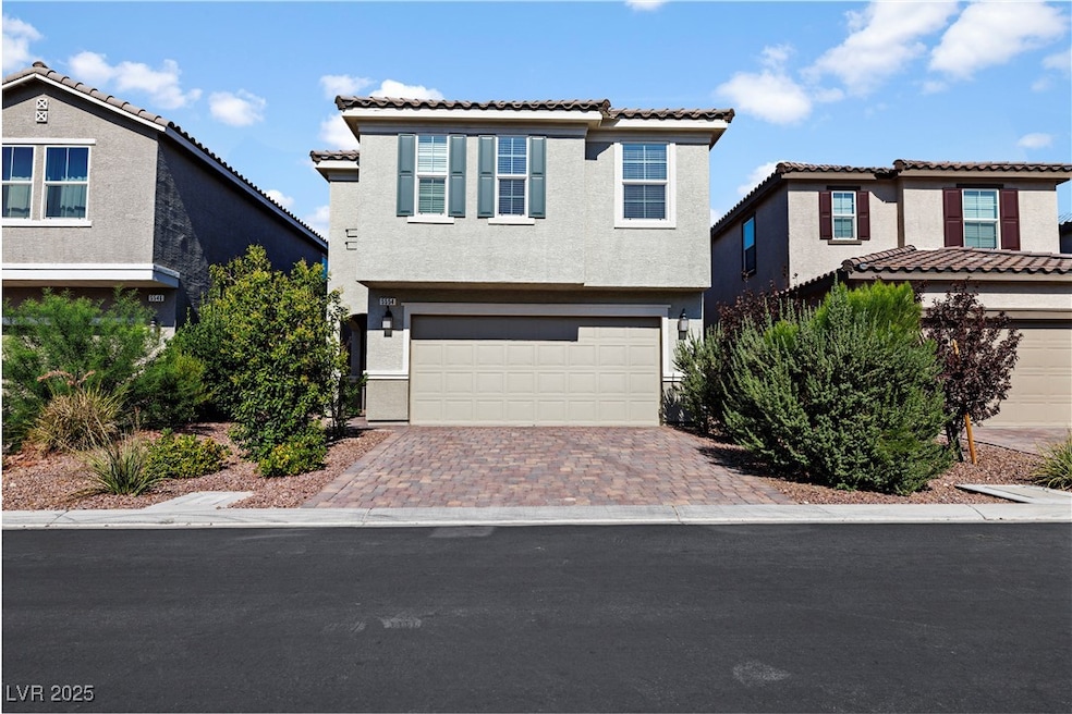 View of front of property with stucco siding, deco