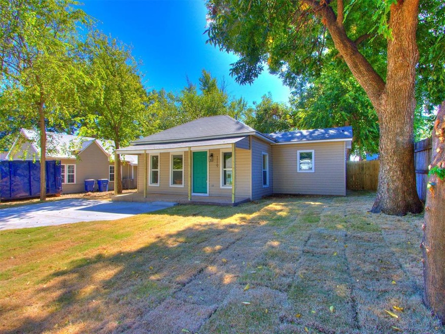 Ranch-style house featuring a front yard