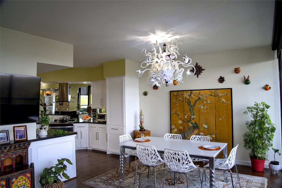 The open layout with the dining space and kitchen
