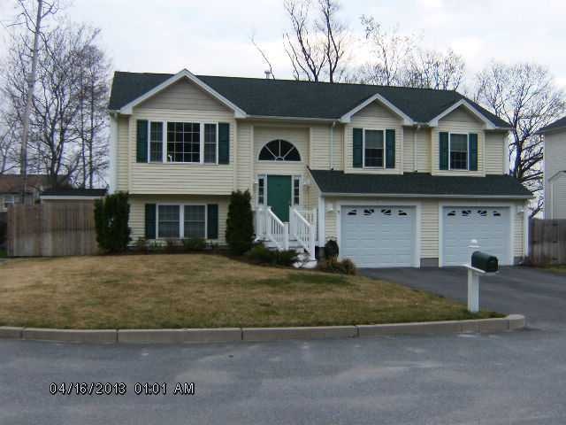 Exterior Front. Vinyl siding, Inground sprinklers,