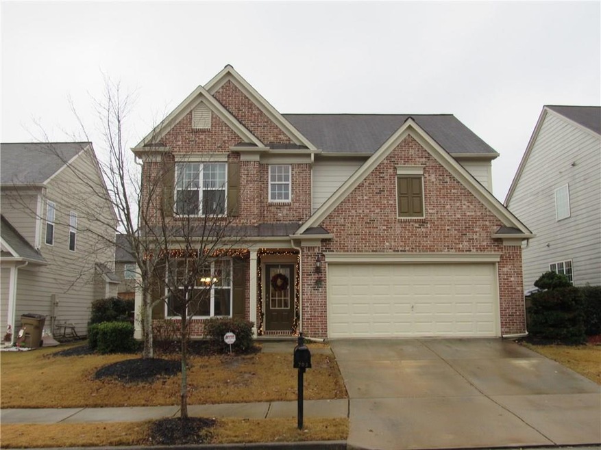 Brick Front and Covered Porch! Level Driveway!
