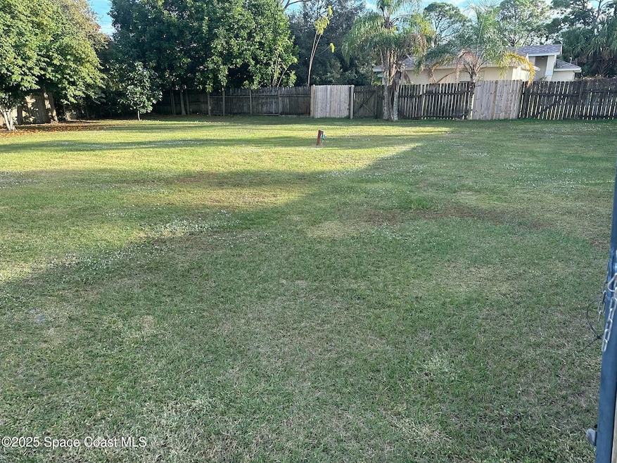 6775 Buxton Ave, Port Saint John, FL 32927 - photo 1