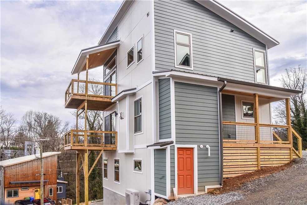 1 of 4 modern new homes! Cool modern design with great use of windows and decks, covered front porch, 2 walk in exterior storage rooms