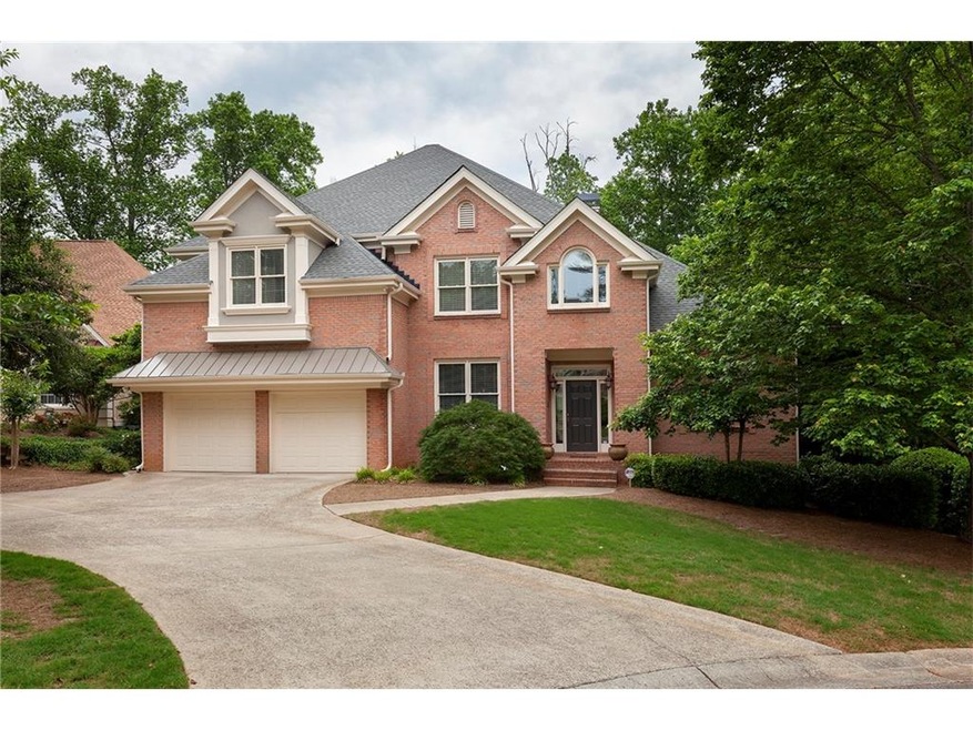 This lovely four side brick home sits on a level c