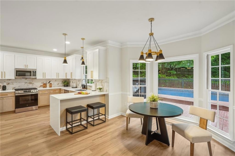 Kitchen featuring appliances with stainless steel 
