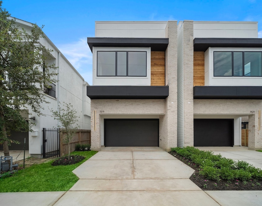Sleek contemporary design with brick and wood acce