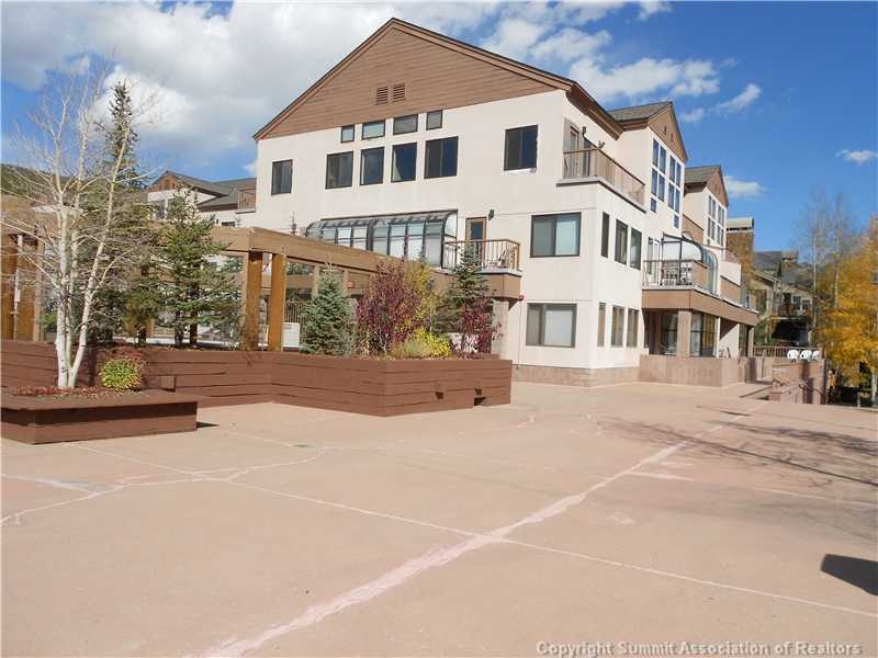 Exterior Front. Note 2 large outdoor Hot Tubs.  Vi