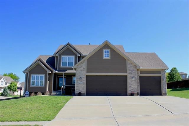 1528 Deer Ridge Ct, Raymore, MO 64083 - photo 1
