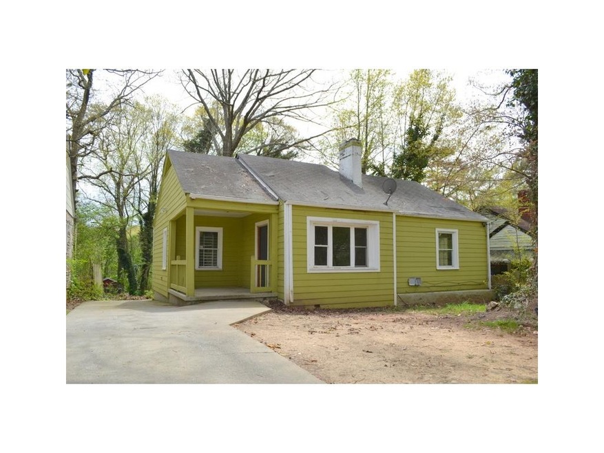 FRONT OF HOME WITH COVERED FRONT PORCH