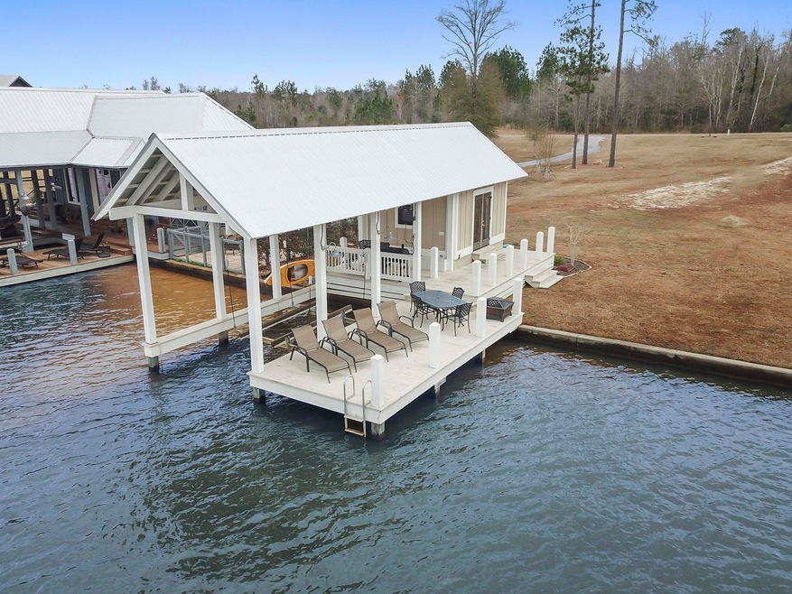 Efficiency Boathouse and .62 Ac Lot!