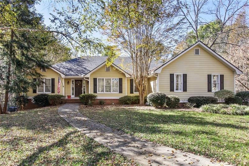 4 sided brick and plank siding home sits on .87 ac