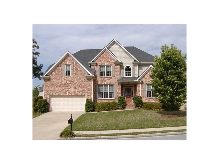 Exterior Front. Stately custom home with all the b
