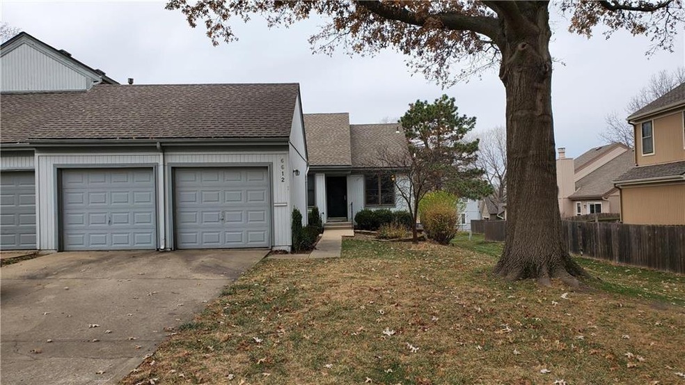 2 Car large garage, nice driveway and low entrance