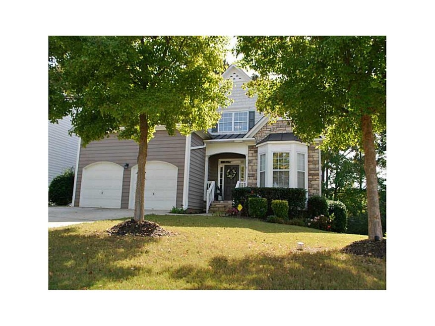 Exterior Front. Level Front Yard*Landscape Lightin