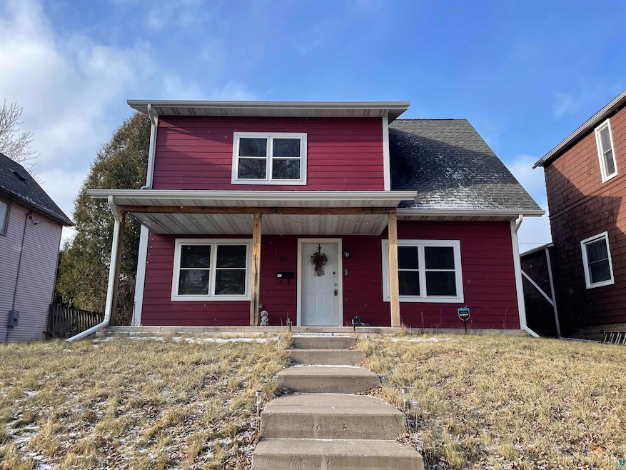View of property featuring a porch
