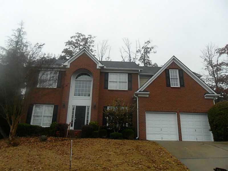 Exterior Front. Brick front with new paint on exte