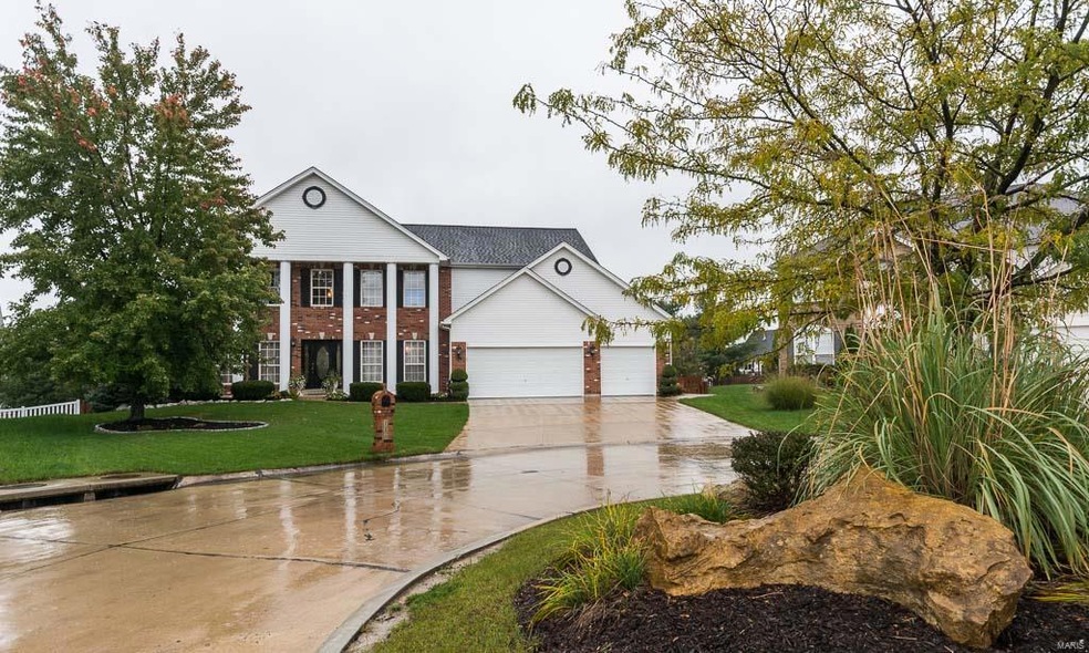 Great curb appeal in this private mini cul-de-sac!