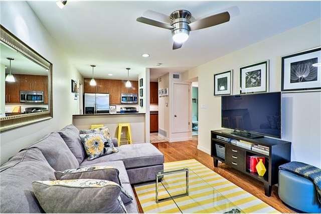 Open floor plan, hardwood flooring in Living Room