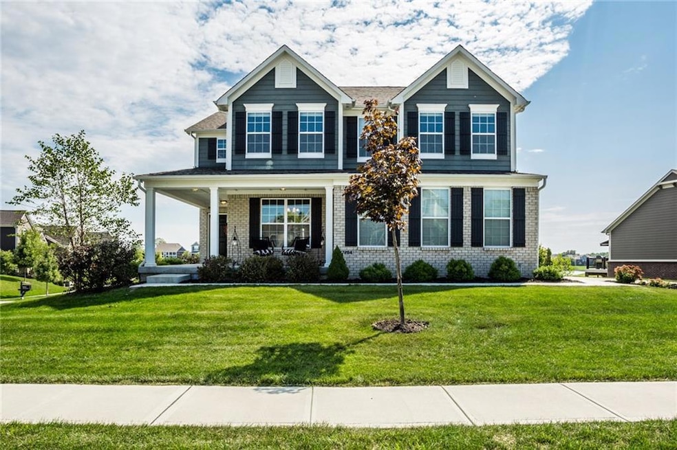 Beautiful, 4 year young home, on raised corner homesite, over looking beautiful community lake.