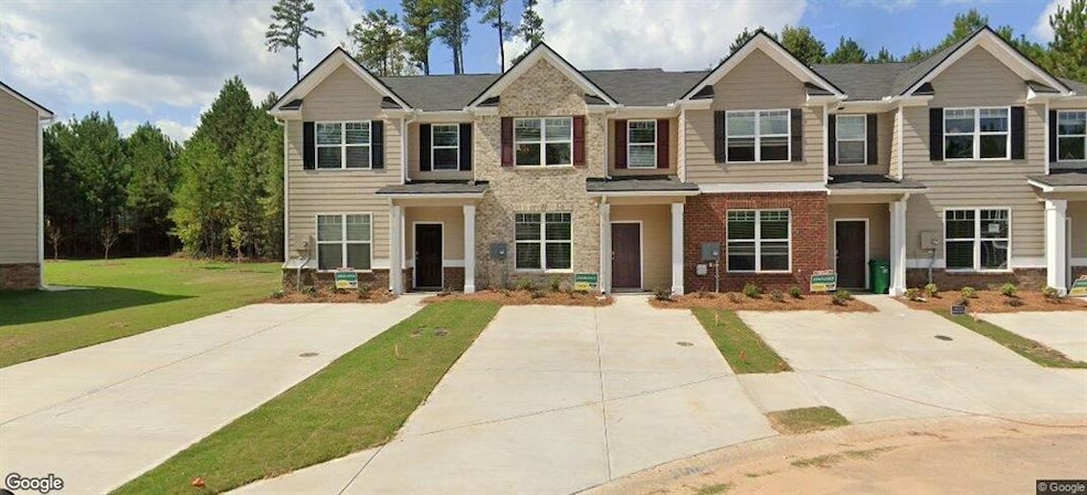 View of front of property with a front lawn