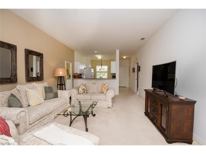 Comfortable living room as seen from the lanai. No